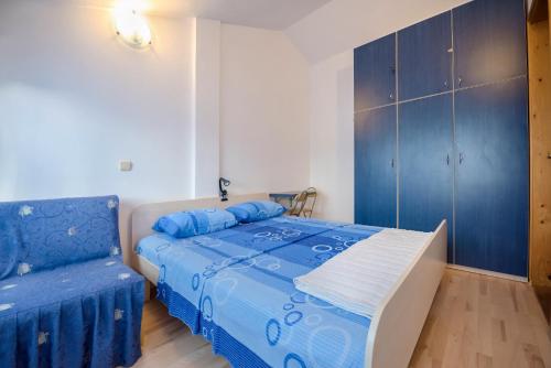 Postel nebo postele na pokoji v ubytování Apartmani Topolovec