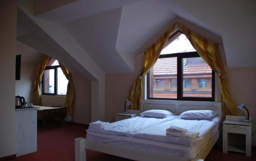 Postel nebo postele na pokoji v ubytování Guest House ANEX