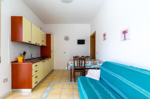 Η κουζίνα ή μικρή κουζίνα στο Residence La Perla - Ametista