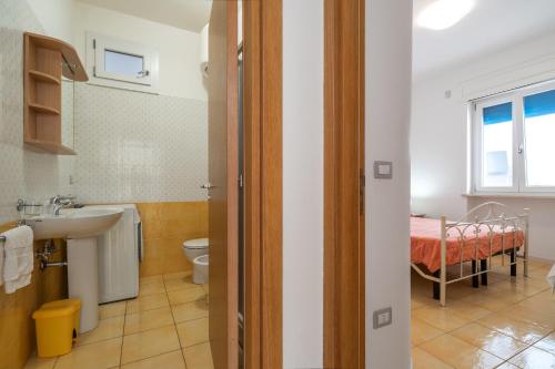 Ένα μπάνιο στο Residence La Perla - Ametista