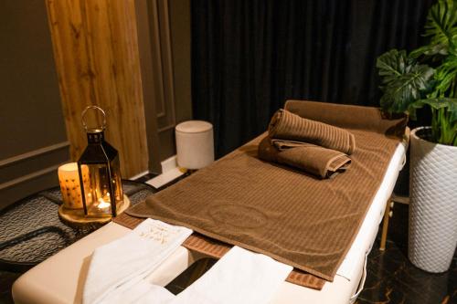 Postel nebo postele na pokoji v ubytování Promocje Amber Park Spa