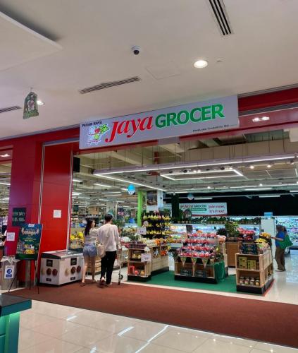 a couple of people walking through a grocery store at 2 Bedrooms Suites at Mesahill Nilai with Mall by D'KAY HOMES, near USIM KLIA in Nilai