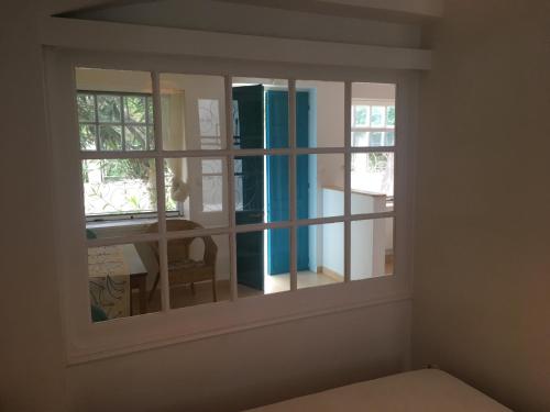 Ένα ή περισσότερα κρεβάτια σε δωμάτιο στο Cosy Studio in Lefkada town