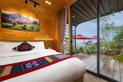 Ένα ή περισσότερα κρεβάτια σε δωμάτιο στο JK Sapa Bungalow & Breakfast