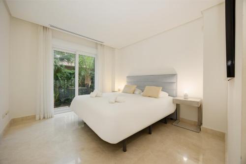 Postel nebo postele na pokoji v ubytování Penthouse with sea views in Nueva Andalucia