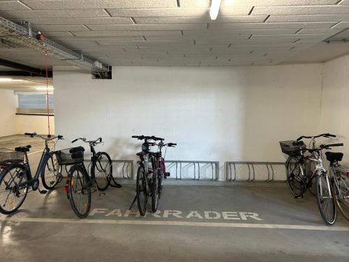 a group of bikes parked in a garage at LUX PENTHOUSE Klopeiner See Apartment Ferienwohnung FeWo in Sankt Kanzian