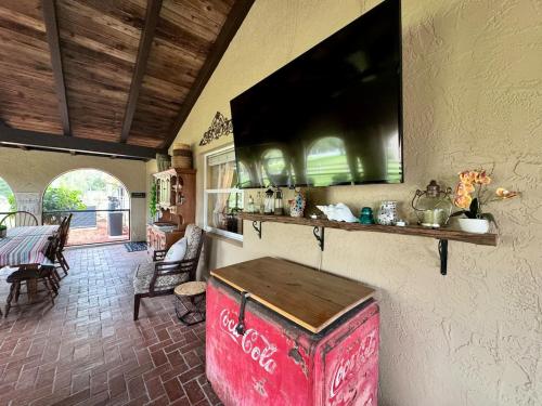 a kitchen with a red island in a room at Paradise at Peaceful in Palm BayTiki Bar Pool Spa 4 Bedroom 2 Full Bathrooms 2 half Bathrooms in Palm Bay