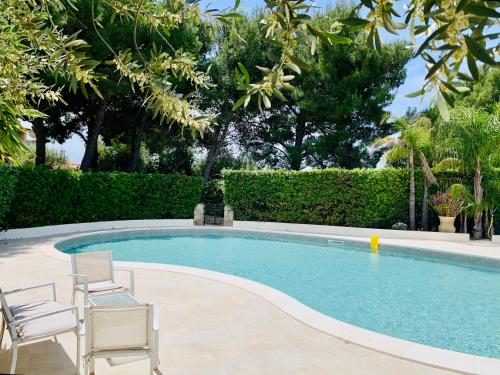 The swimming pool at or close to Il Calesse - Noto