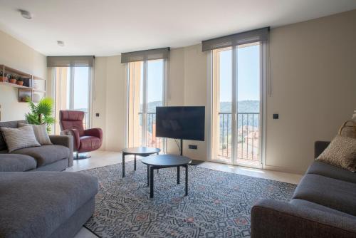 Televisyen dan/atau pusat hiburan di Apartaments Turístics Cardona, MAGI