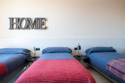 Katil atau katil-katil dalam bilik di Apartaments Turístics Cardona, MAGI