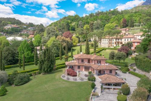 an aerial view of a house in the mountains at Hotel Royal in Menaggio