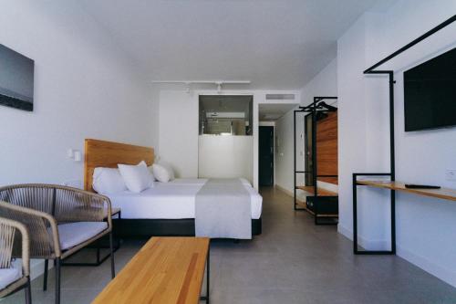 Кровать или кровати в номере HOTEL ALOVE