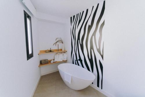 Un baño de HOTEL ALOVE