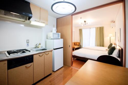 Η κουζίνα ή μικρή κουζίνα στο GuestHouse MIYABI