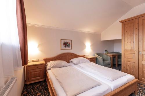 Postel nebo postele na pokoji v ubytování Heart Hotel Nordstern