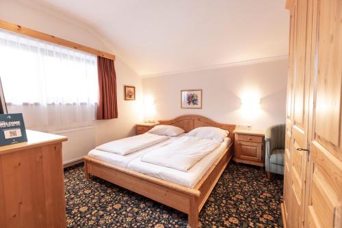 Postel nebo postele na pokoji v ubytování Heart Hotel Nordstern