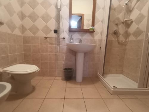 Koupelna v ubytování Hotel Sirios