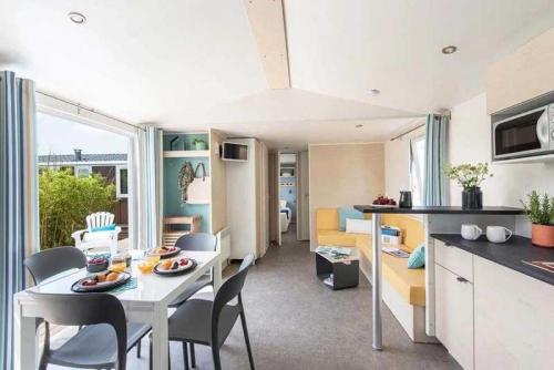 Kuchyň nebo kuchyňský kout v ubytování Camping 4 étoiles - Piscine - ccbagid