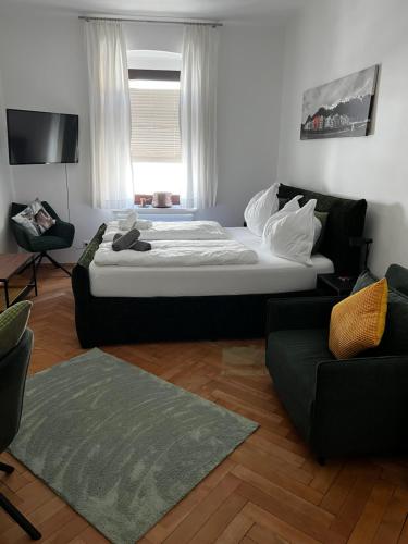 Ένα ή περισσότερα κρεβάτια σε δωμάτιο στο Apartment ANTON Innsbruck