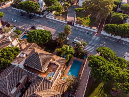 an overhead view of a house with a street at Hotel Azalea Playa in Chiclana de la Frontera