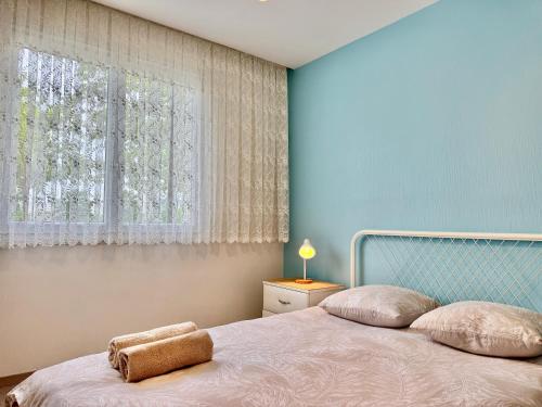 Postel nebo postele na pokoji v ubytování Zenova