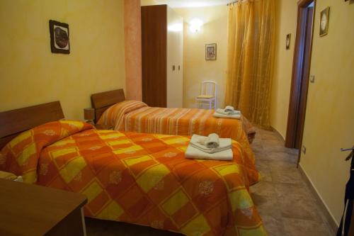 Ένα ή περισσότερα κρεβάτια σε δωμάτιο στο Bed and Breakfast Victoria