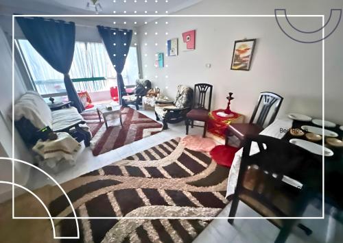 an aerial view of a living room with a couch at Gadou Rooms in Port Said