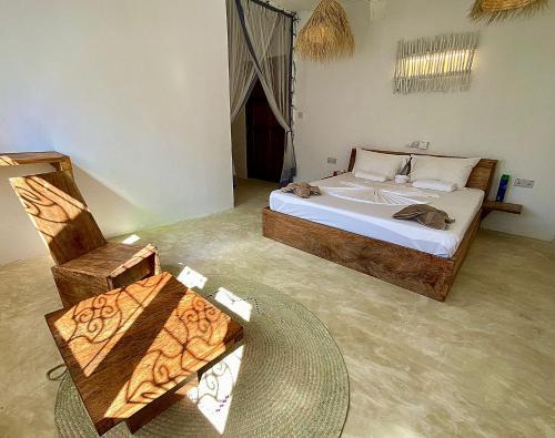 Кровать или кровати в номере Tunda Lodge