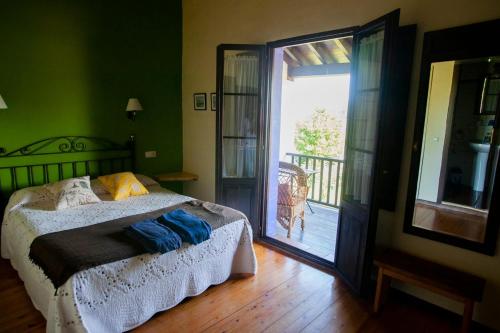 Ένα ή περισσότερα κρεβάτια σε δωμάτιο στο Casa Rural La Cerra