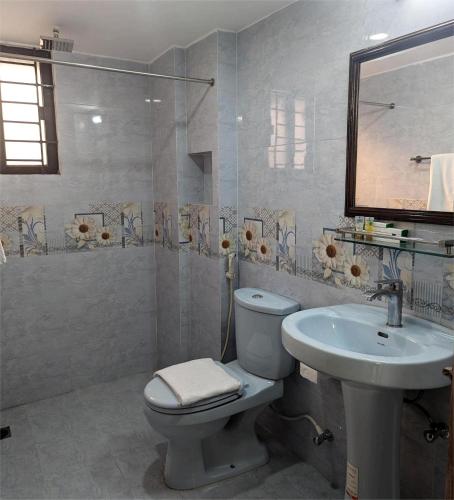 Ванная комната в Royal Regent Suites Dhaka