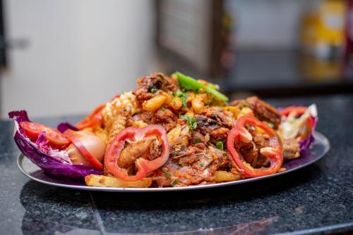a plate of food on a table at Verona Hotel and Conference Center in Ruiru