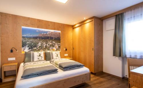 Ένα ή περισσότερα κρεβάτια σε δωμάτιο στο Apartments Picenin