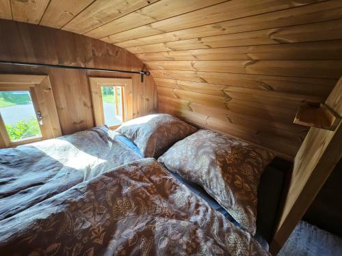 Ένα ή περισσότερα κρεβάτια σε δωμάτιο στο Camping im Fass