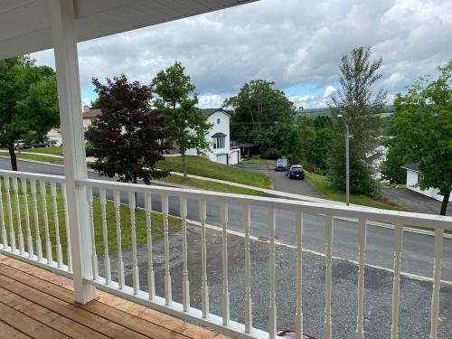 a balcony with a view of a street at Talisman's Gem in Fredericton