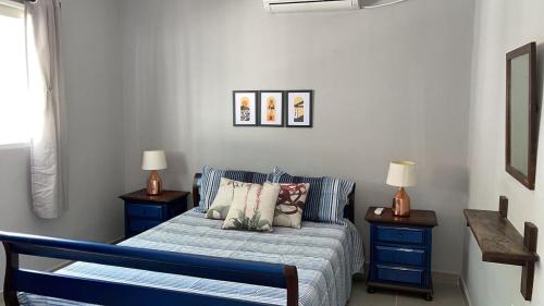 Ένα ή περισσότερα κρεβάτια σε δωμάτιο στο Refúgio Aconchegante no Recife, a Poucos Minutos da UFPE