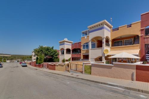 a street view of a building in a city at Descanso en la Costa in Dehesa de Campoamor