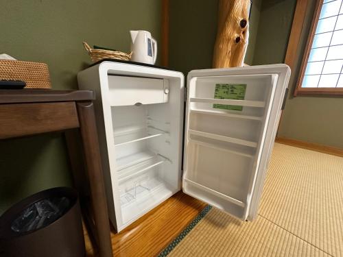 Una cocina o cocineta en レイクピアエンゼル山中湖