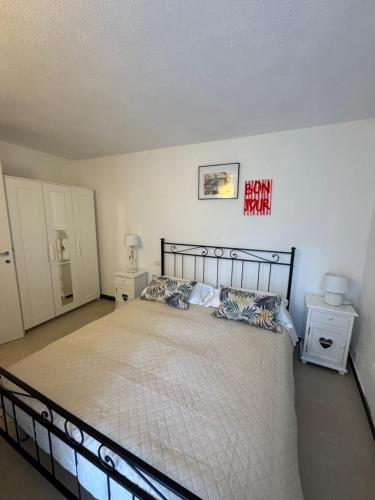 a bedroom with a large bed with two pillows at Affittacamere PZ in Vernazza