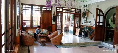 Zona de estar de Ronglyang Villa Homestay Near MG Road