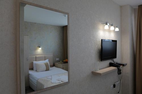 Postel nebo postele na pokoji v ubytování Hotel Spa Terma
