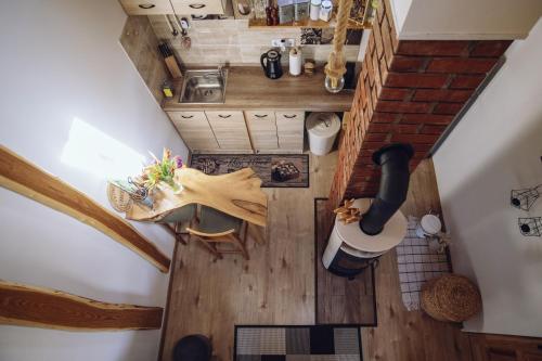 an overhead view of a tiny house with a fireplace at Balatoni Présházikó in Szőlősgyörök