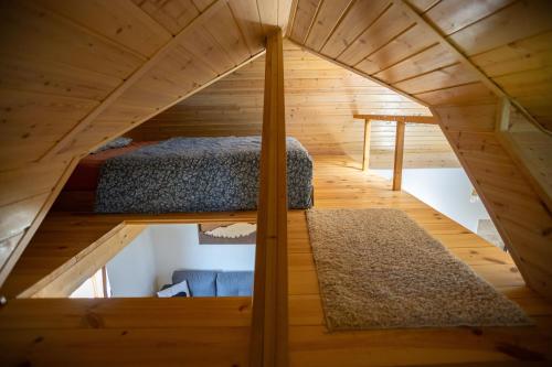 an overhead view of a bedroom in a tiny house at Balatoni Présházikó in Szőlősgyörök