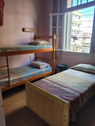 Cama ou camas em um quarto em Tao Station 752