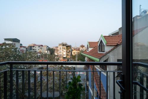 a view of a city from a balcony at Luxe Paradise Residence Trinh Cong Son in Hanoi