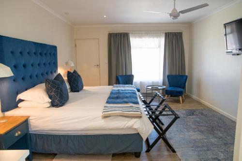 Penguino Guesthouseにあるベッド