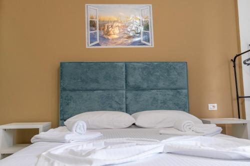 Ένα ή περισσότερα κρεβάτια σε δωμάτιο στο Central Garden Residence Sofia - Free Parking
