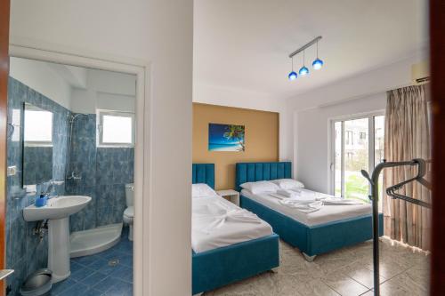Ένα ή περισσότερα κρεβάτια σε δωμάτιο στο Central Garden Residence Sofia - Free Parking