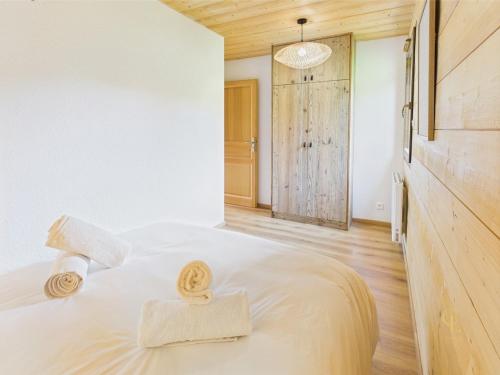 Ένα ή περισσότερα κρεβάτια σε δωμάτιο στο Chalet METCY 12 pers, Jacuzzi, 8km Gerardmer