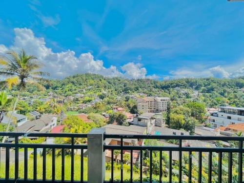 a view of a city from a balcony at Terrace Kandy in Kandy