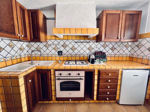 Køkken eller tekøkken på WILD BLUE Sardinia